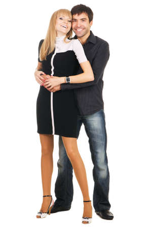 Beautiful young couple in casual clothing, white backgroundの写真素材