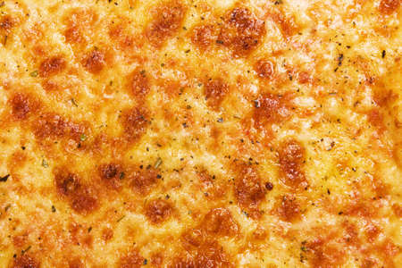 Closeup picture of cheese pizzaの写真素材