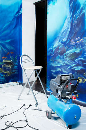 Professional aerography equipment in home interiorの写真素材