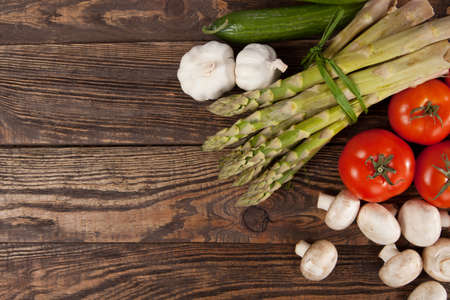 Fresh vegetables on a wooden tableの写真素材