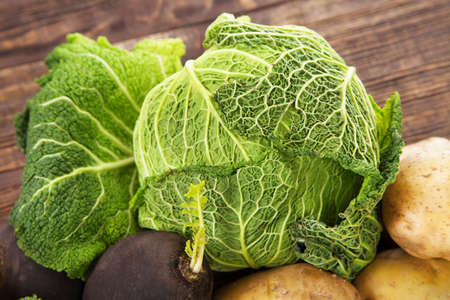 Fresh cabbage on a tableの写真素材