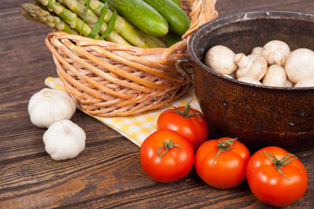 Fresh vegetables on a wooden tableの写真素材