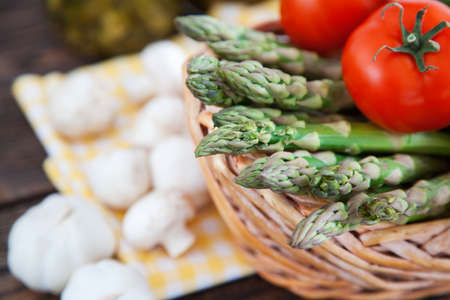 Fresh vegetables on a wooden tableの写真素材