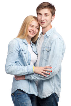 Beautiful young couple on white backgroundの写真素材