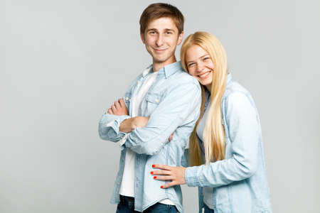 Beautiful young couple on white background