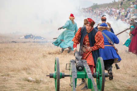 OLSZTYN, POLAND - AUG 11  Reconstruction of medieval wars at the Olsztyn castle on August 11, 2013