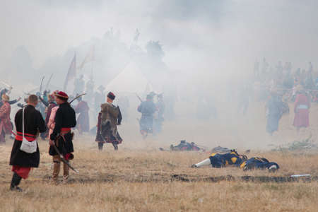 OLSZTYN, POLAND - AUG 11  Reconstruction of medieval wars at the Olsztyn castle on August 11, 2013