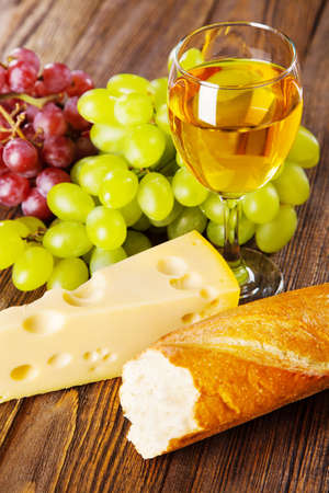 Wine, grapes and cheese still lifeの写真素材