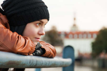 Dreamy stylish lady in a european city