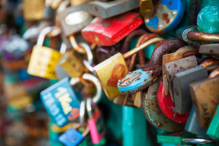 Lots of locks on a bridgeの写真素材