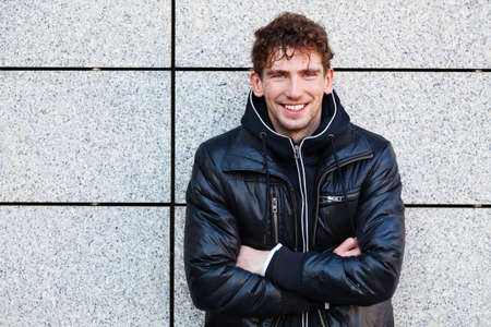 Handsome young man in casual autumn clothes