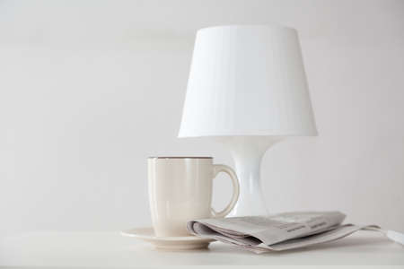 Newspaper and a coffee cupの写真素材