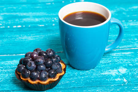 Coffee with blueberry cakeの写真素材