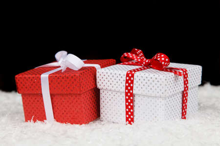 Christmas gift boxes in snowの写真素材