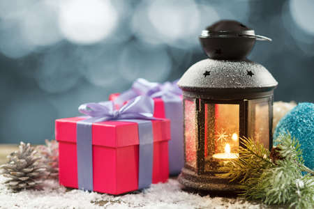 Vintage lantern with seasonal winter decorationの写真素材