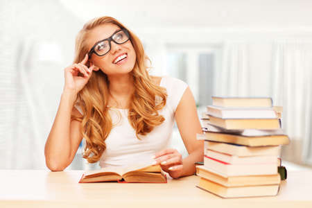 Young student reading books