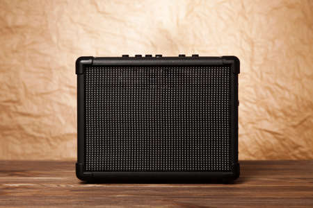 Guitar amplifier on yellow background.の写真素材