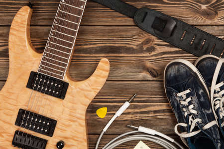 Modern 7 string electric guitar with natural finish