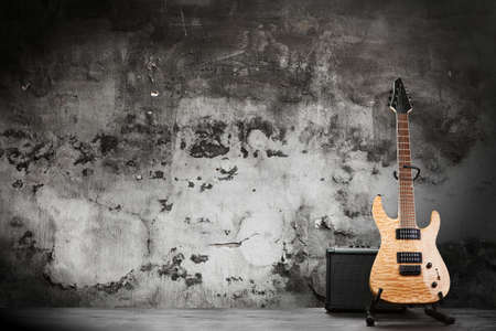 Modern electric guitar on dark backgroundの写真素材