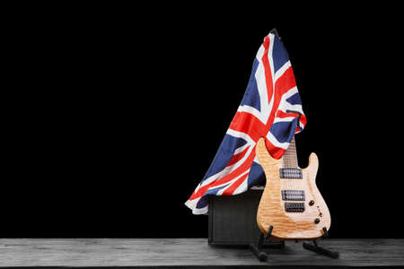 Modern electric guitar on dark backgroundの写真素材