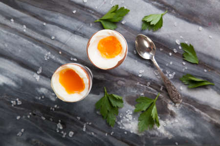Fresh boiled eggs on marble background