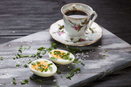 Boiled eggs and coffee in retro styleの写真素材