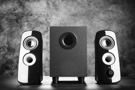 Modern black sound speakers on dark backgroundの写真素材