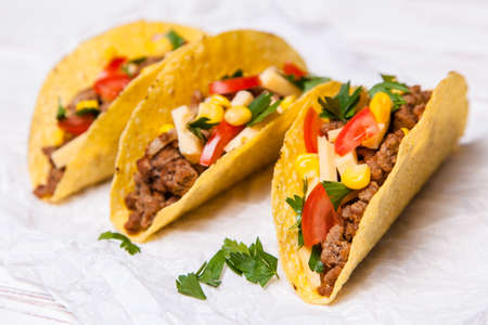 Mexican food - delicious tacos with ground beefの写真素材