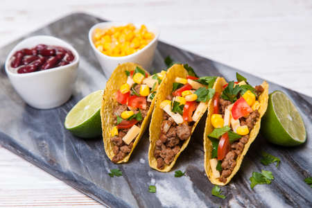 Mexican food - delicious tacos with ground beefの写真素材