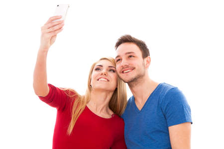 Young beautiful couple isolated on white background