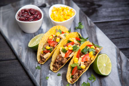 Mexican food - delicious tacos with ground beefの写真素材