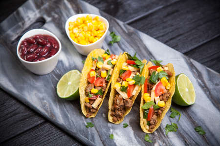 Mexican food - delicious tacos with ground beefの写真素材