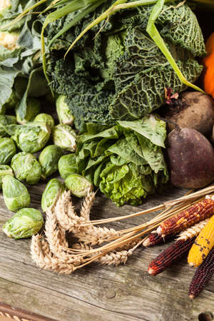 Assortment of green vegetables on wooden surface