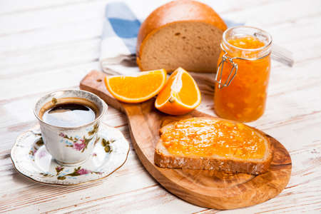 Slices of bread with jam for breakfastの写真素材