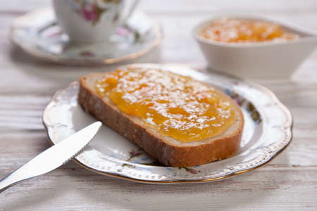 Slices of bread with jam for breakfastの写真素材