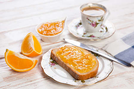 Slices of bread with jam for breakfastの写真素材