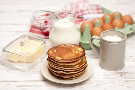Delicious pancakes and batter ingredientsの写真素材
