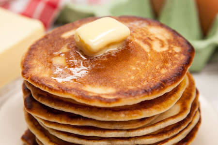 Delicious pancakes and batter ingredientsの写真素材