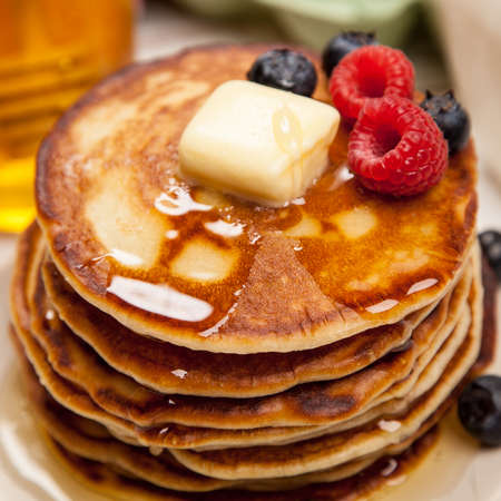 High pile of delicious pancakes with blueberryの写真素材
