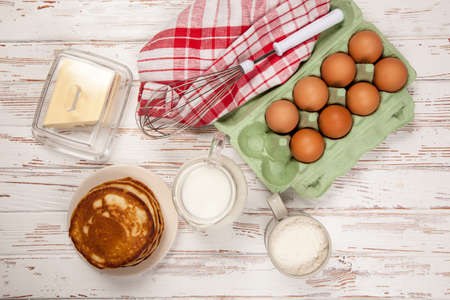 Delicious pancakes and batter ingredientsの写真素材