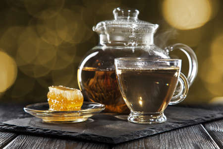 Glass teapot on black backgroundの写真素材