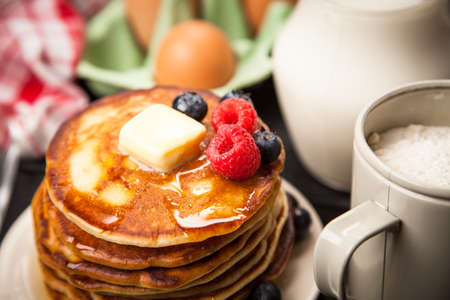 High pile of delicious pancakes with blueberryの写真素材