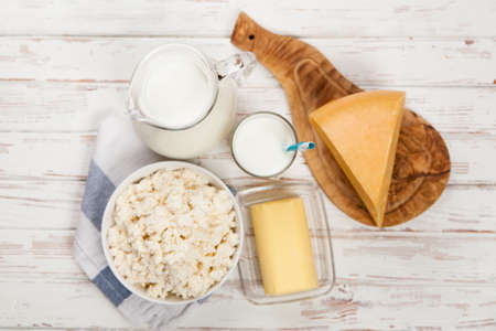 Milk and dairy products on a wooden table