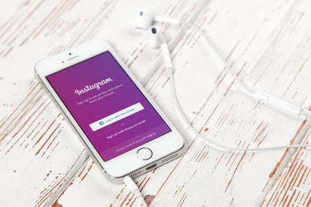 WROCLAW, POLAND - APRIL 12, 2016: Apple iPhone SE smartphone with Instagram app on screenのeditorial素材