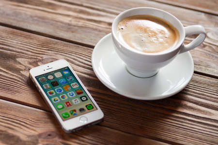 WROCLAW, POLAND - APRIL 12, 2016: Apple iPhone SE smartphoneのeditorial素材