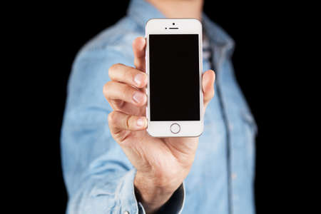 WROCLAW, POLAND - APRIL 12, 2016: Apple iPhone SE smartphoneのeditorial素材