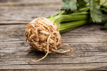 Fresh organic vegetables on wooden surfaceの写真素材