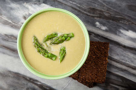 Bowl of asparagus cream soupの写真素材