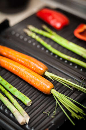 Assortment of grilled vegetables on dark backgroundの写真素材