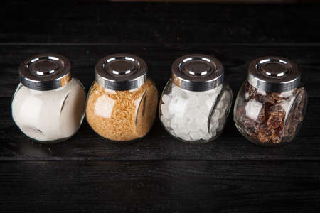 Different types of sugar on black backound